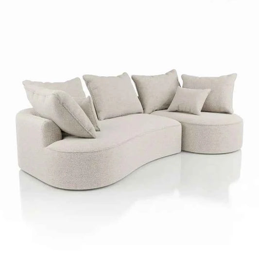 Sofa Tirano mit Ottomane & Dekokissen aus Boucléstoff Creme